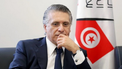 FILE PHOTO: Nabil Karoui, businessman and owner of the private channel Nessma TV, submits his candidacy for the presidential election in Tunis